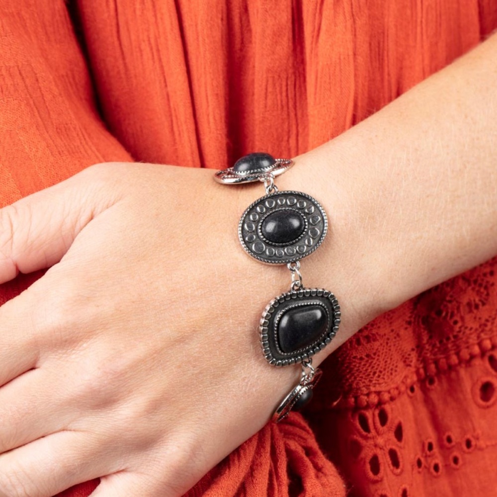 Artisanal oval black stone silver tone bracelet